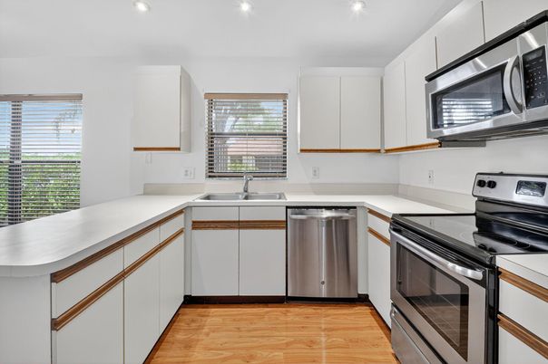 Interior, Kitchen, Recessed Lighting, Stainless Steel Appliances, Wood Texture Flooring