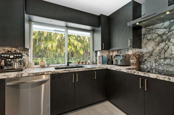 Interior, Kitchen, Marble Walls, Recessed Lighting, Stainless Steel Appliances