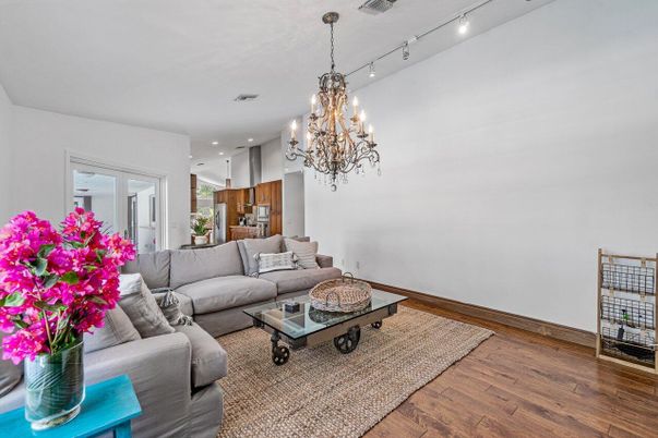 Chandelier, Interior, Kitchen, Living room, Recessed Lighting, Stainless Steel Appliances, Wood Texture Flooring