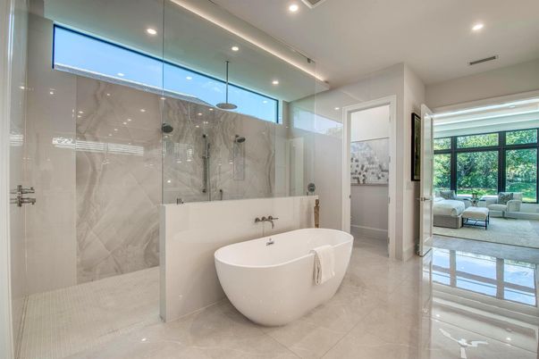 Bathroom, Free Standing Baths, Glass Shower, Interior, Marble Walls, Recessed Lighting