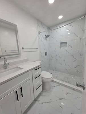 Bathroom, Dual Sink Vanities, Interior, Marble, Marble Walls, Recessed Lighting