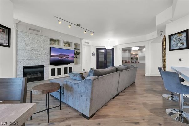 Dining room, Fireplace, Interior, Living room, Pendant Lights, Stone Walls, Wood Texture Flooring