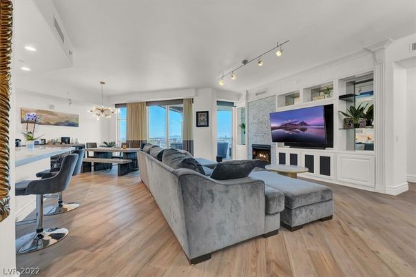 Dining room, Fireplace, Interior, Living room, Pendant Lights, Recessed Lighting, Wood Texture Flooring