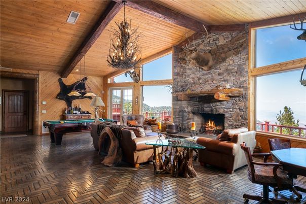 Billiard Table, Chandelier, Fireplace, Game Room, Interior, Living room, Stone Walls, Wooden Beams, Wooden Ceilings, Wooden Walls