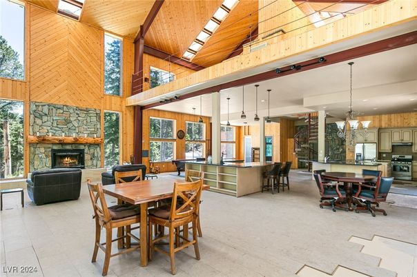 Chandelier, Dining room, Fireplace, Interior, Kitchen, Living room, Pendant Lights, Stainless Steel Appliances, Wooden Beams, Wooden Ceilings, Wooden Walls