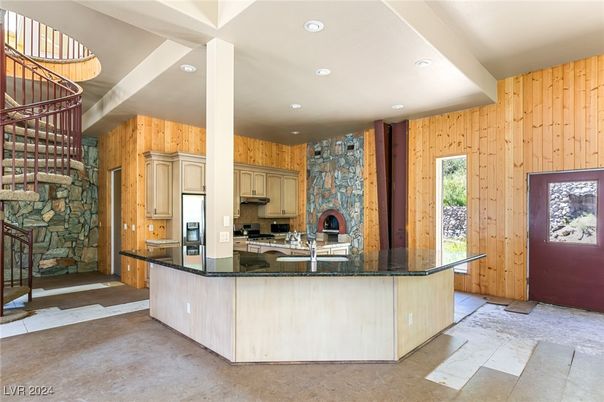 Fireplace, Interior, Kitchen, Recessed Lighting, Stainless Steel Appliances, Stone Walls, Wooden Walls