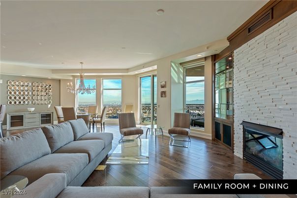 Chandelier, Dining room, Fireplace, Interior, Living room, Pendant Lights, Recessed Lighting, Stone Walls, Wood Texture Flooring