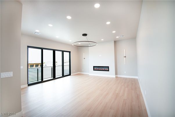 Empty room, Fireplace, Interior, Pendant Lights, Recessed Lighting, Wood Texture Flooring