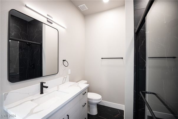 Bathroom, Dual Sink Vanities, Interior, Marble Walls, Recessed Lighting