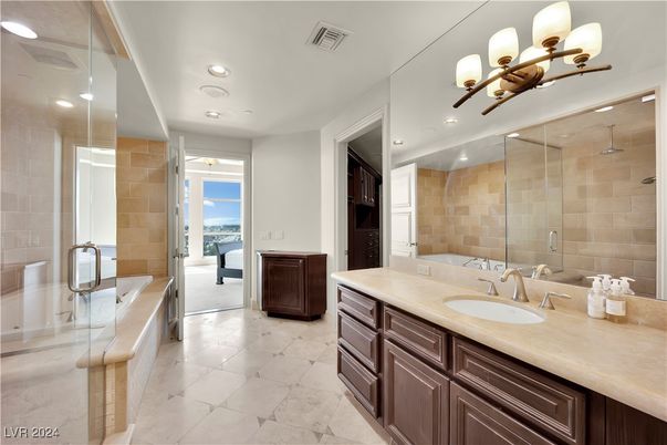 Bathroom, Dual Sink Vanities, Glass Shower, Interior, Recessed Lighting, Stone Walls