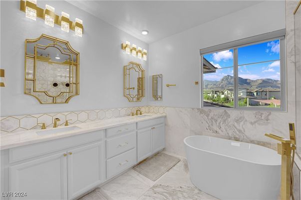 Bathroom, Dual Sink Vanities, Free Standing Baths, Interior, Marble, Marble Walls, Recessed Lighting