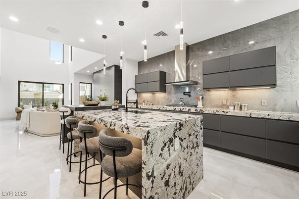 Interior, Kitchen, Marble Walls, Pendant Lights, Recessed Lighting, Stainless Steel Appliances