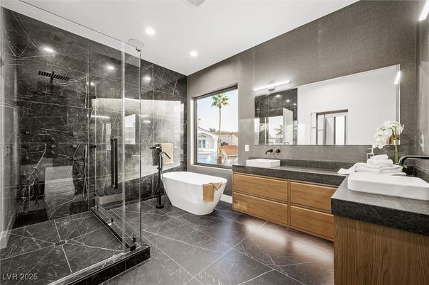 Bathroom, Dual Sink Vanities, Free Standing Baths, Glass Shower, Interior, Marble Walls, Recessed Lighting