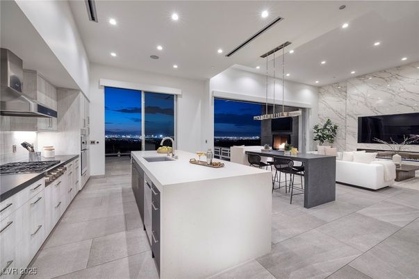 Dining room, Fireplace, Interior, Kitchen, Living room, Marble Walls, Pendant Lights, Recessed Lighting, Stainless Steel Appliances