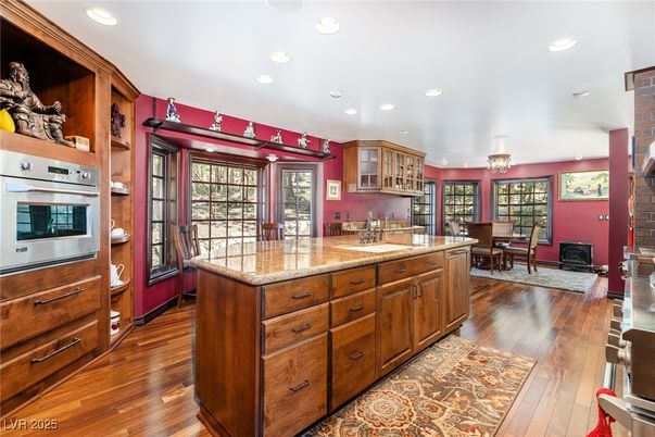 Chandelier, Dining room, Interior, Kitchen, Recessed Lighting, Stainless Steel Appliances, Wood Texture Flooring