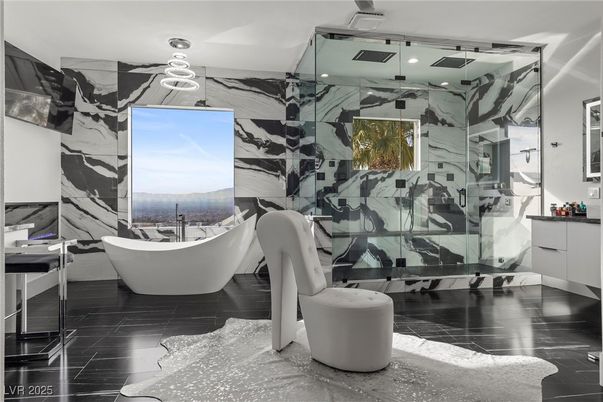 Bathroom, Free Standing Baths, Glass Shower, Interior, Marble Walls, Recessed Lighting, Wood Texture Flooring