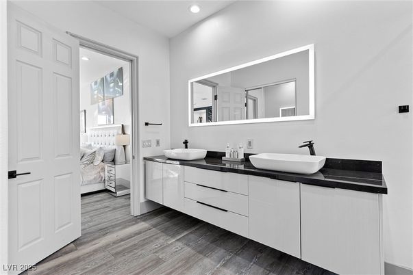 Bathroom, Dual Sink Vanities, Interior, Recessed Lighting, Wood Texture Flooring