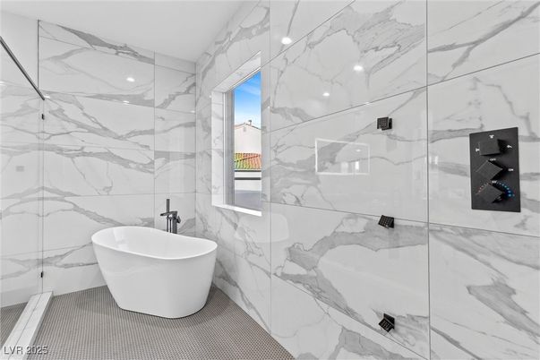Bathroom, Free Standing Baths, Glass Shower, Interior, Marble Walls, Recessed Lighting