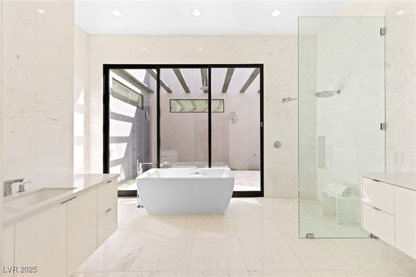 Bathroom, Free Standing Baths, Glass Shower, Interior, Marble Walls, Recessed Lighting