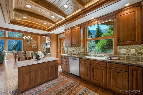 Chandelier, Dining room, Interior, Kitchen, Recessed Lighting, Stainless Steel Appliances, Wooden Beams, Wooden Ceilings, Wood Texture Flooring