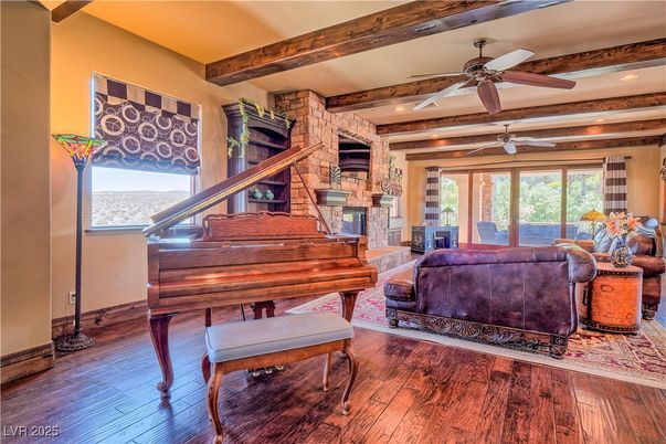 Fireplace, Interior, Living room, Piano, Recessed Lighting, Stone Walls, Wooden Beams, Wood Texture Flooring