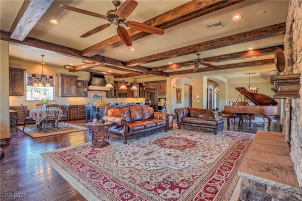 Chandelier, Dining room, Fireplace, Interior, Kitchen, Living room, Pendant Lights, Piano, Recessed Lighting, Wooden Beams, Wood Texture Flooring