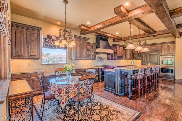 Chandelier, Dining room, Interior, Kitchen, Pendant Lights, Recessed Lighting, Stainless Steel Appliances, Wooden Beams, Wood Texture Flooring