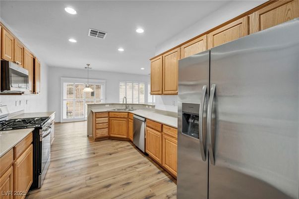 Interior, Kitchen, Pendant Lights, Recessed Lighting, Stainless Steel Appliances, Wood Texture Flooring