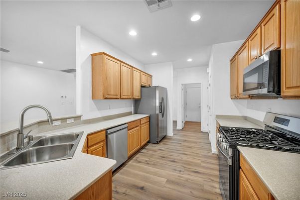 Interior, Kitchen, Recessed Lighting, Stainless Steel Appliances, Wood Texture Flooring