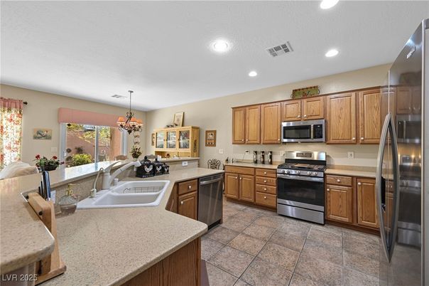 Chandelier, Dining room, Interior, Kitchen, Recessed Lighting, Stainless Steel Appliances