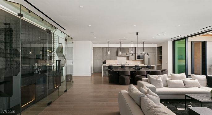 Dining room, Interior, Kitchen, Living room, Pendant Lights, Recessed Lighting, Stainless Steel Appliances, Wood Texture Flooring