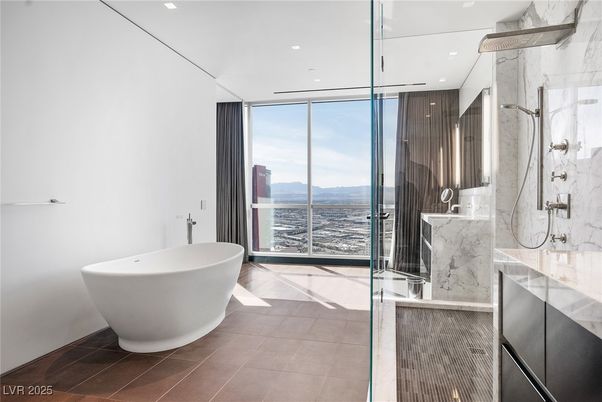 Bathroom, Free Standing Baths, Glass Shower, Interior, Marble Walls, Recessed Lighting