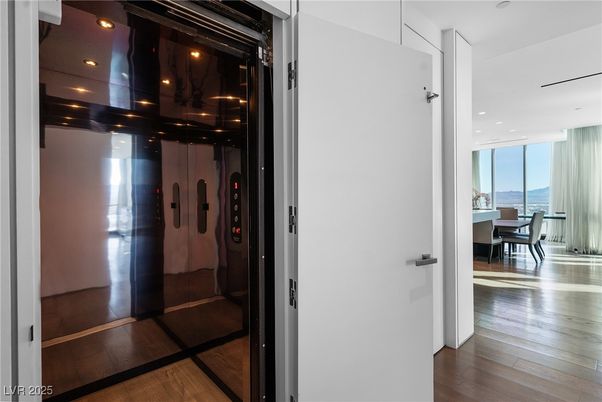 Elevator, Interior, Recessed Lighting, Wood Texture Flooring
