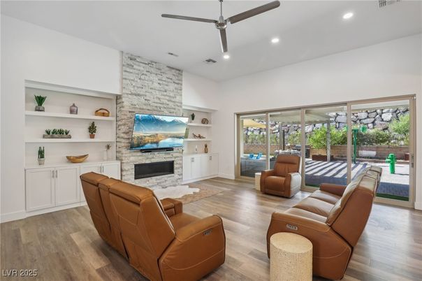 Fireplace, Interior, Living room, Recessed Lighting, Stone Walls, Wood Texture Flooring