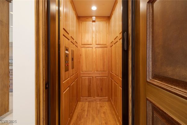 Elevator, Interior, Recessed Lighting, Wood Texture Flooring, Wooden Walls