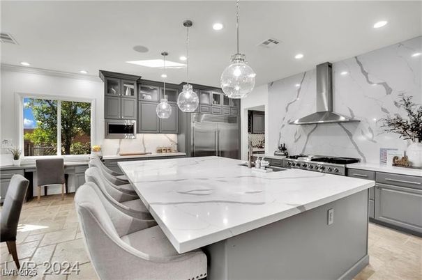 Interior, Kitchen, Marble Walls, Pendant Lights, Recessed Lighting, Stainless Steel Appliances