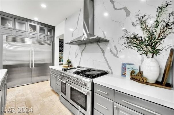 Interior, Kitchen, Marble Walls, Recessed Lighting, Stainless Steel Appliances