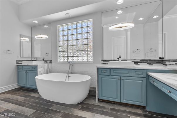 Bathroom, Dual Sink Vanities, Free Standing Baths, Interior, Pendant Lights, Recessed Lighting, Wood Texture Flooring