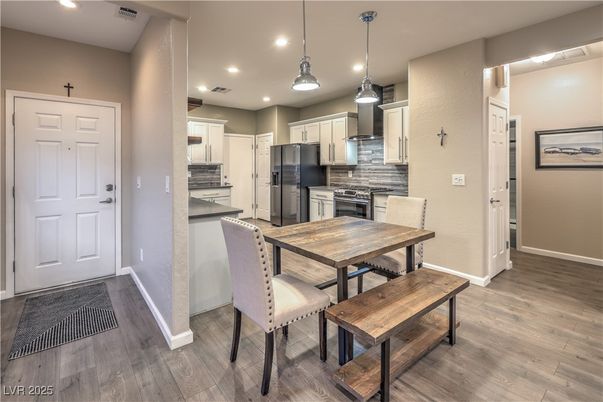 Dining room, Interior, Kitchen, Pendant Lights, Recessed Lighting, Stainless Steel Appliances, Wood Texture Flooring