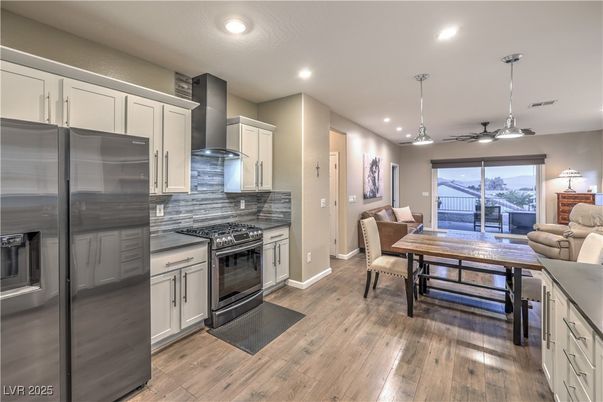 Dining room, Interior, Kitchen, Living room, Pendant Lights, Recessed Lighting, Stainless Steel Appliances, Wood Texture Flooring