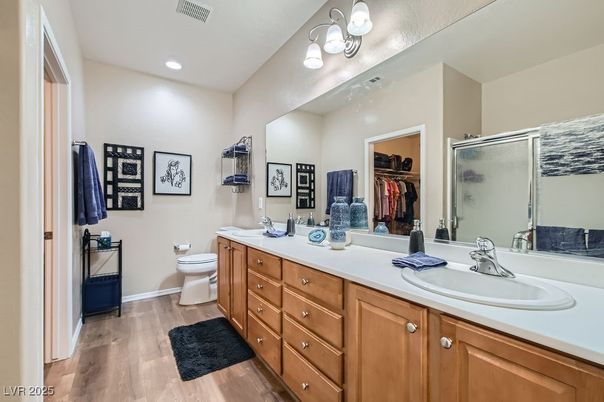 Bathroom, Dual Sink Vanities, Interior, Recessed Lighting, Wood Texture Flooring