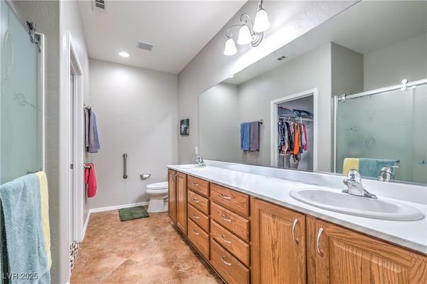 Bathroom, Dual Sink Vanities, Interior, Recessed Lighting, Walk-in Closets