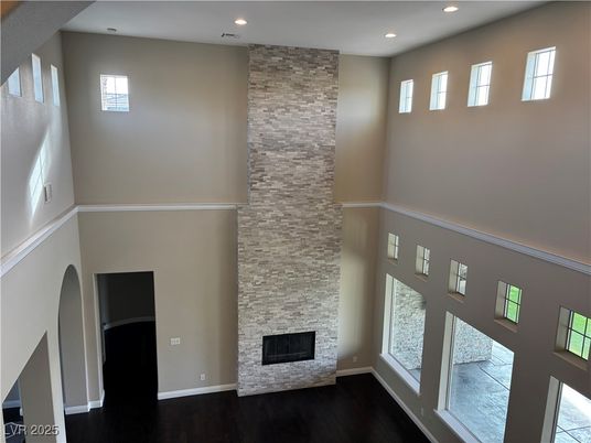 Fireplace, Interior, Recessed Lighting, Stone Walls, Wood Texture Flooring
