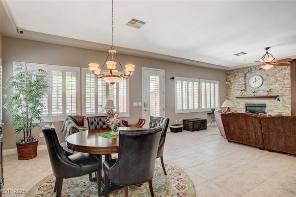 Chandelier, Dining room, Fireplace, Interior, Living room, Pendant Lights, Stone Walls