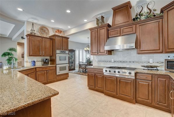 Chandelier, Dining room, Interior, Kitchen, Pendant Lights, Recessed Lighting, Stainless Steel Appliances