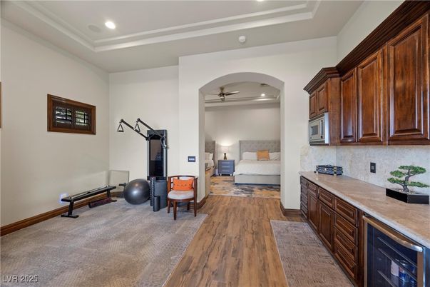 Bedroom, Fitness Equipment, Interior, Recessed Lighting, Wood Texture Flooring