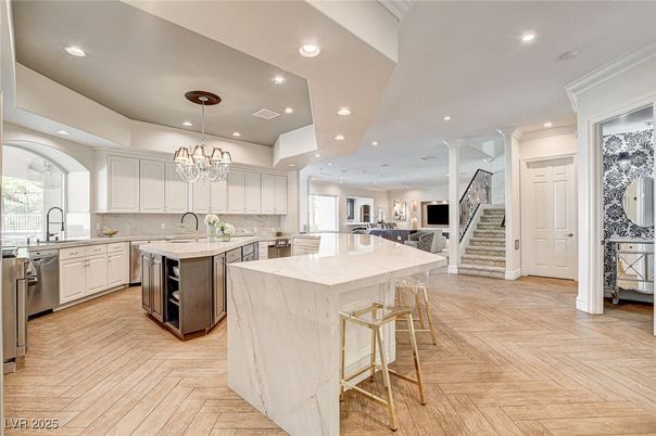 Chandelier, Interior, Kitchen, Pendant Lights, Recessed Lighting, Stainless Steel Appliances, Wood Texture Flooring