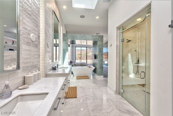Bathroom, Dual Sink Vanities, Free Standing Baths, Glass Shower, Interior, Marble, Marble Walls, Recessed Lighting