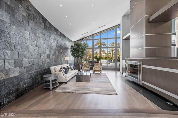 Fireplace, Interior, Living room, Recessed Lighting, Stone Walls, Wood Texture Flooring