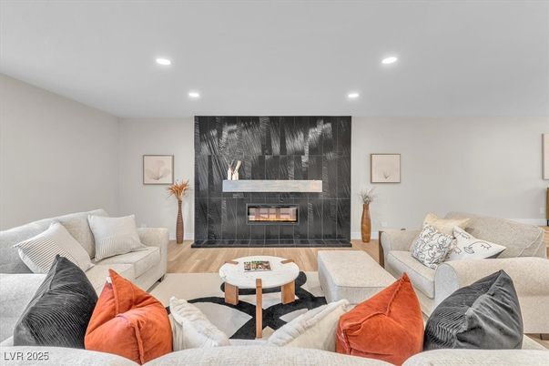Fireplace, Interior, Living room, Recessed Lighting, Wood Texture Flooring